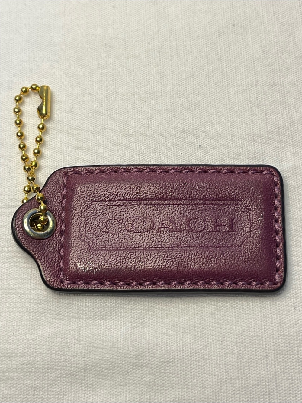Coach Plum Leather Hang Tag with Gold Chain